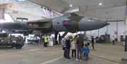 A family waits to go onboard Vulcan XL426 at a Visit the Vulcan Day