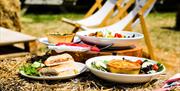 Food on Straw Bales with Deckchairs at Cammas Hall Farm