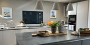 Kitchen-dining room with french doors onto the patio