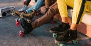 People wearing roller skates