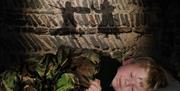 A child asleep in Colchester Castle