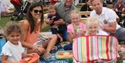 Family and friends enjoying a picnic