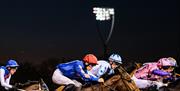 Racing under floodlights at Chelmsford City Racecourse