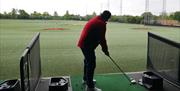 Man playing Topgolf