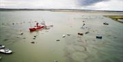 An aerial view of Tollesbury marina with the Fellowship Afloat light-vessel in view.