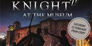 Knights in front of Colchester Castle at night time