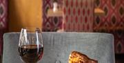 Roast dinner with a glass of red wine