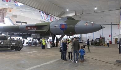 A family waits to go onboard Vulcan XL426 at a Visit the Vulcan Day
