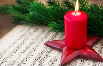 Christmas candle and music