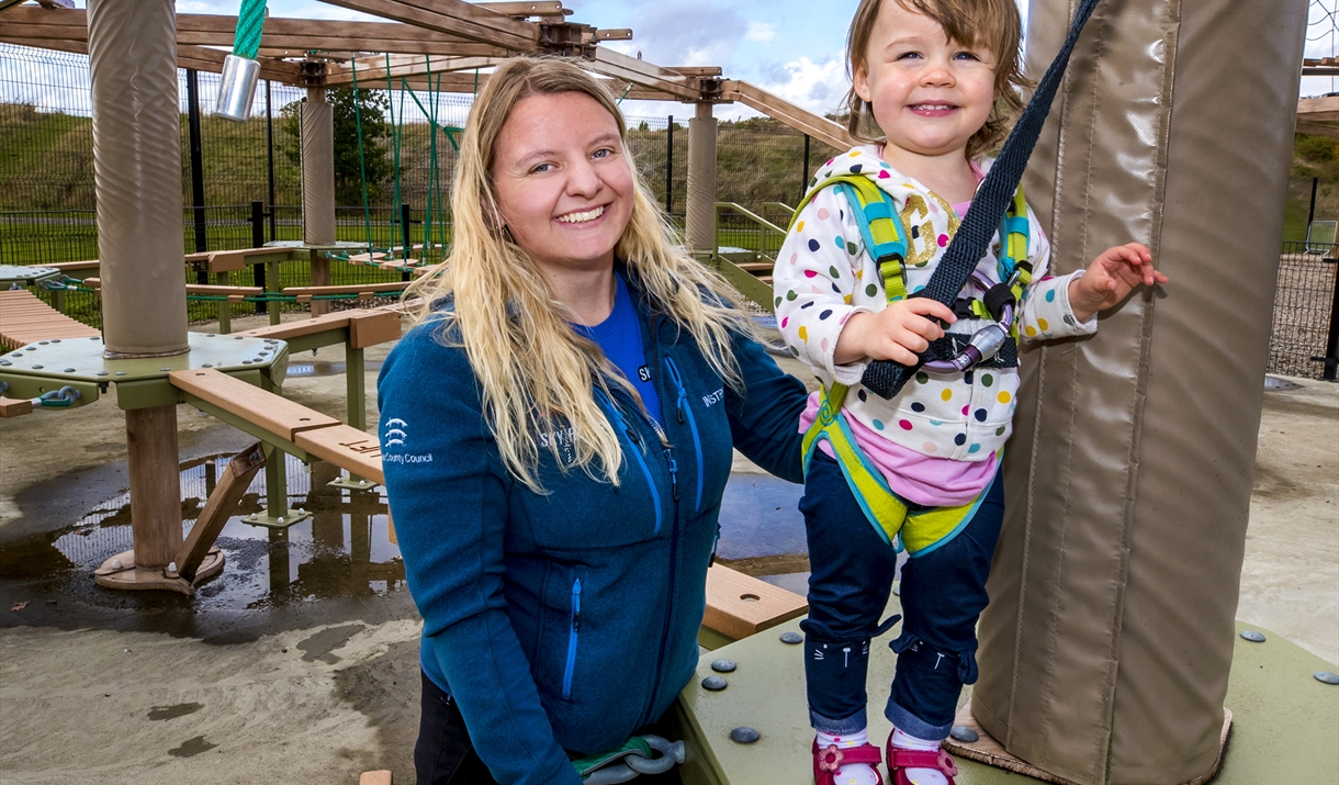 Instructor and child on Sky Ropes Junior