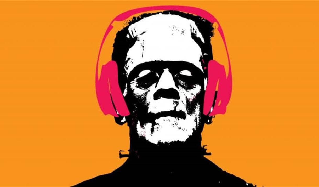 Frankenstein wearing headphones