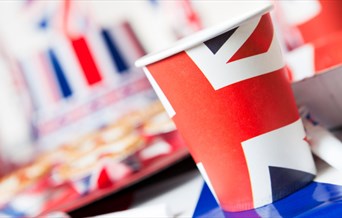 Union Jack themed paper cups and plates