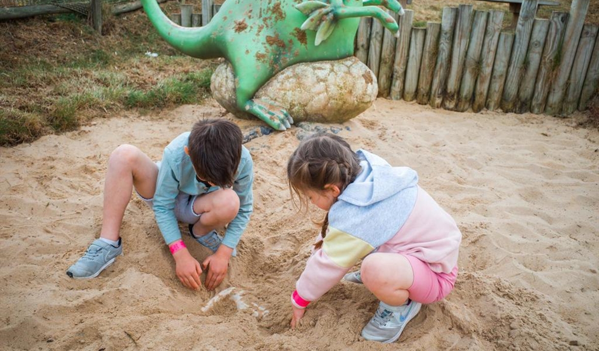 Children discovering fossils Children discovering fossils