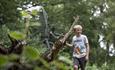 Boy walking around the fairy trail at Trentham Estate