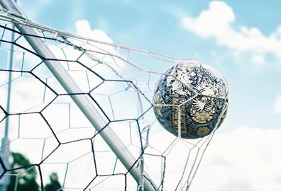 Football in the back of a net