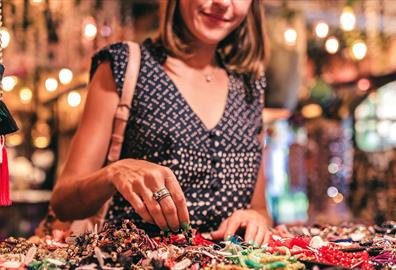 Woman browsing handmade crafts