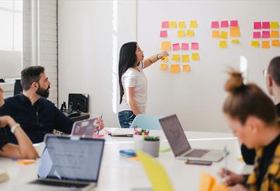 Woman leading a group meeting