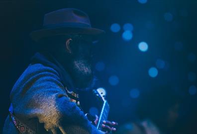 Man playing a guitar