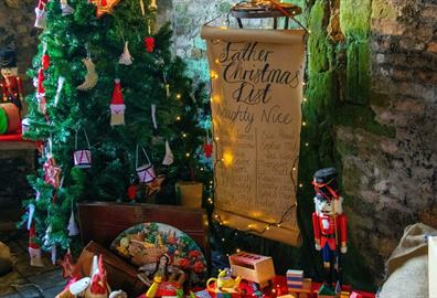 Christmas tree display with naughty and nice list
