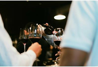 Wine being poured into glasses