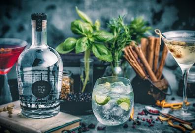 Exeter Gin presented in a glass with ice and a lime