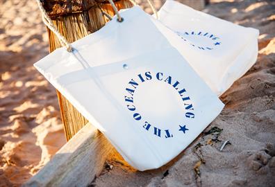 Sails and Canvas bag on the beach