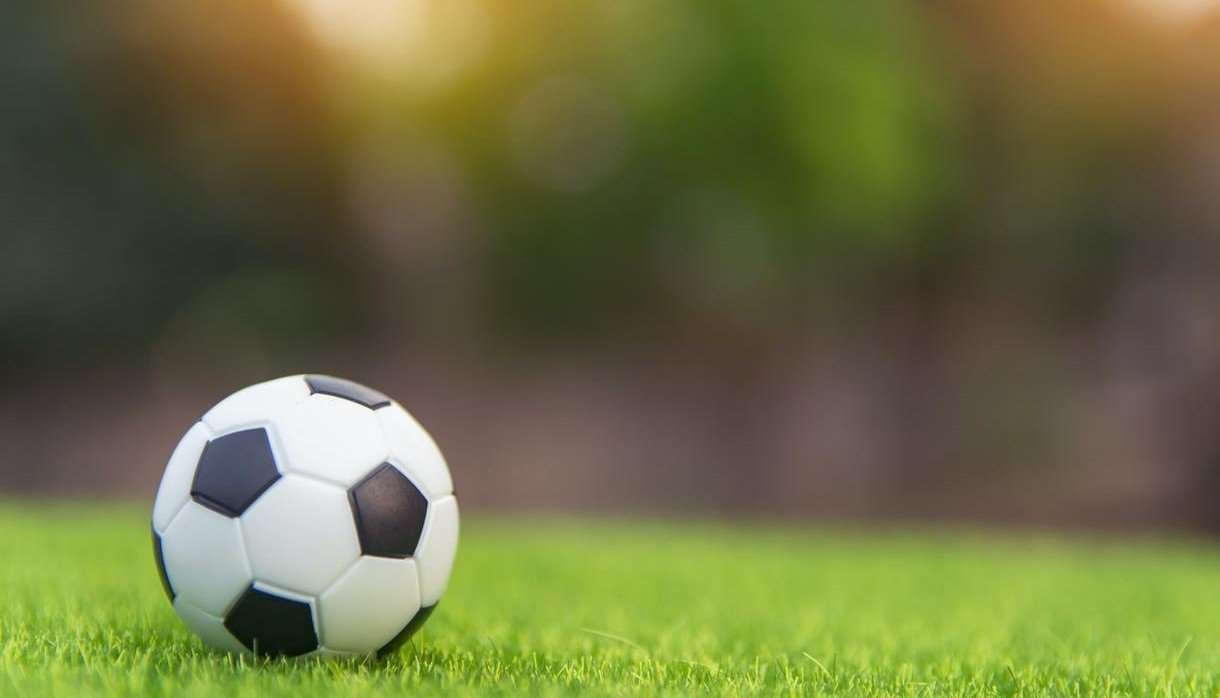 Football sitting on the grass