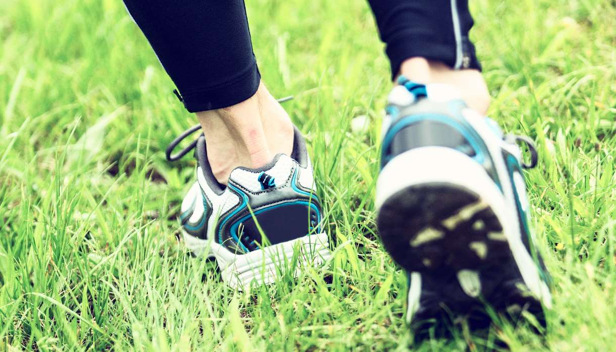 White, black and blue running shoes