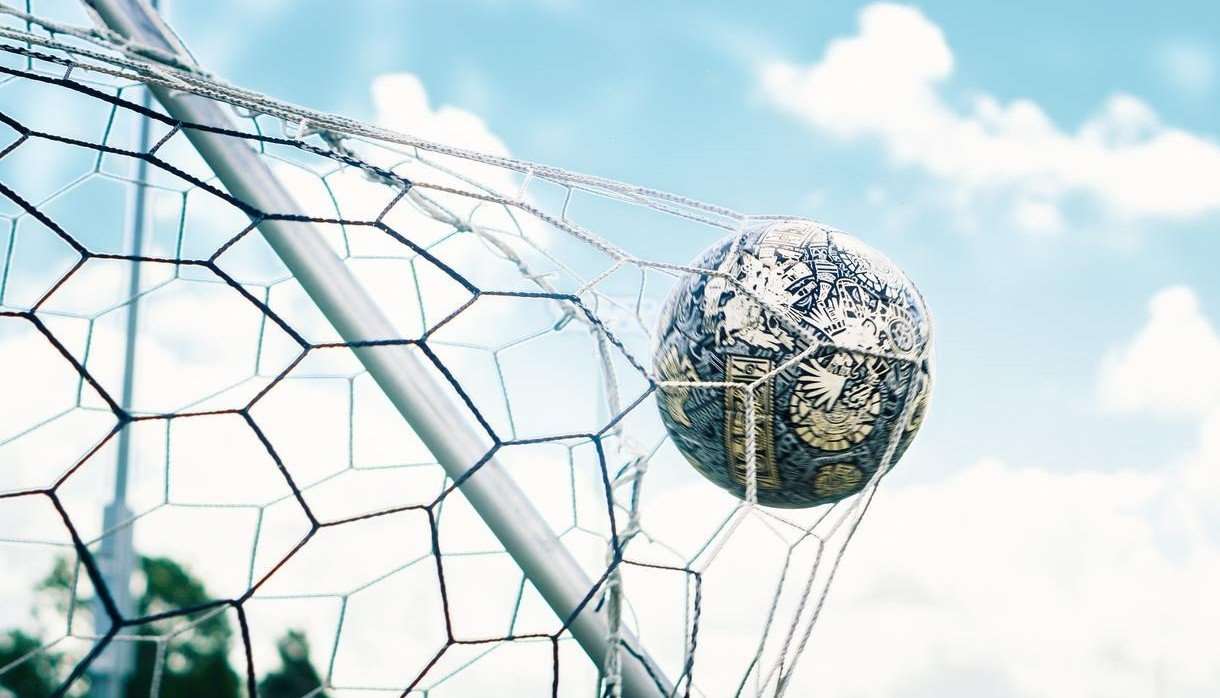 Football in the back of a net
