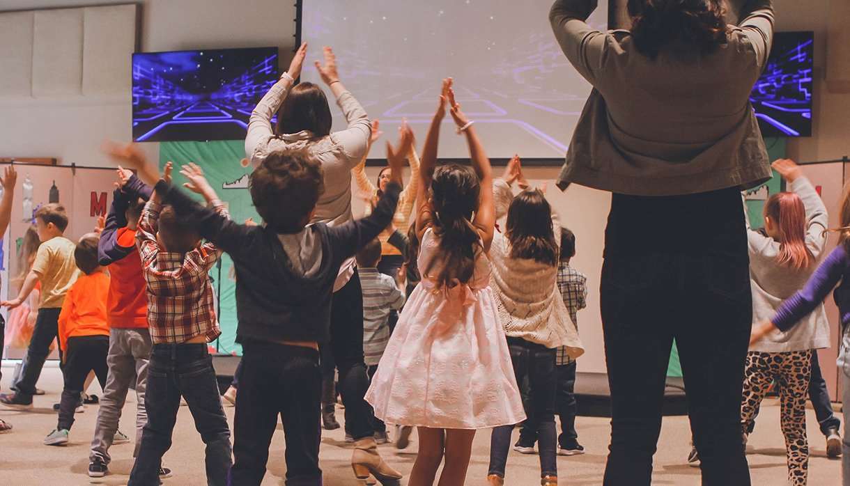 Kids participating in a theatre workshop