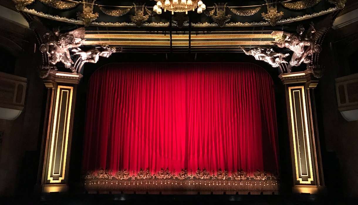 Red curtain at a performance theatre