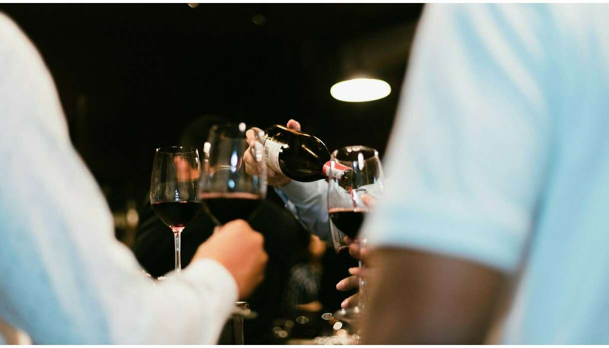 Wine being poured into glasses