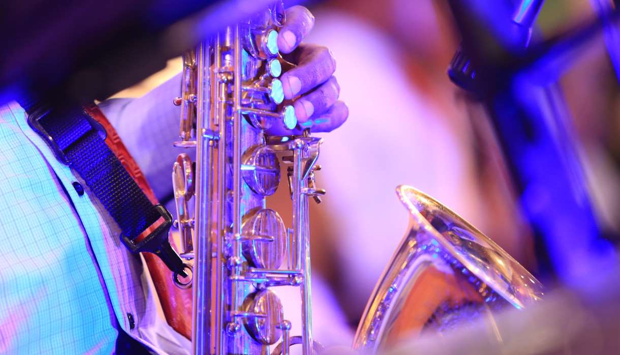 A close up of a golden saxophone