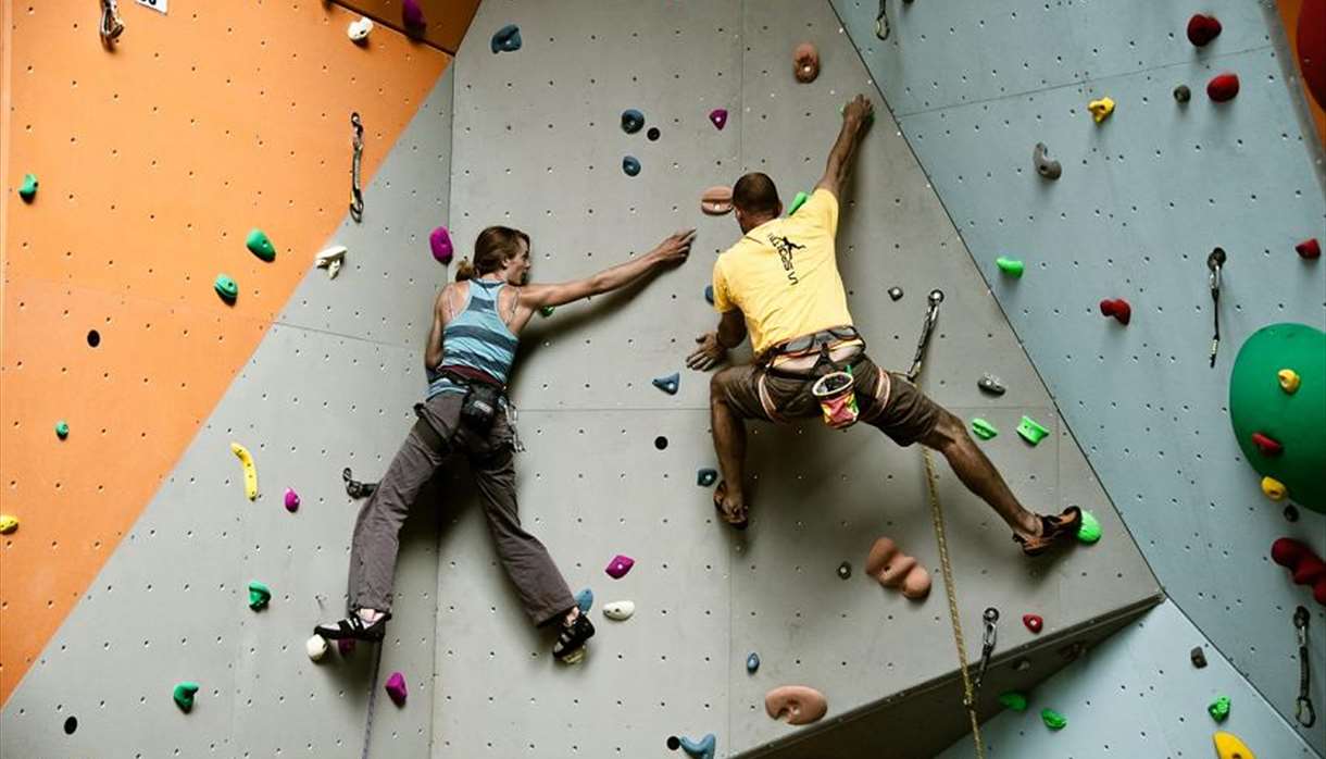 Two people climbing in Quay Climbing Centre