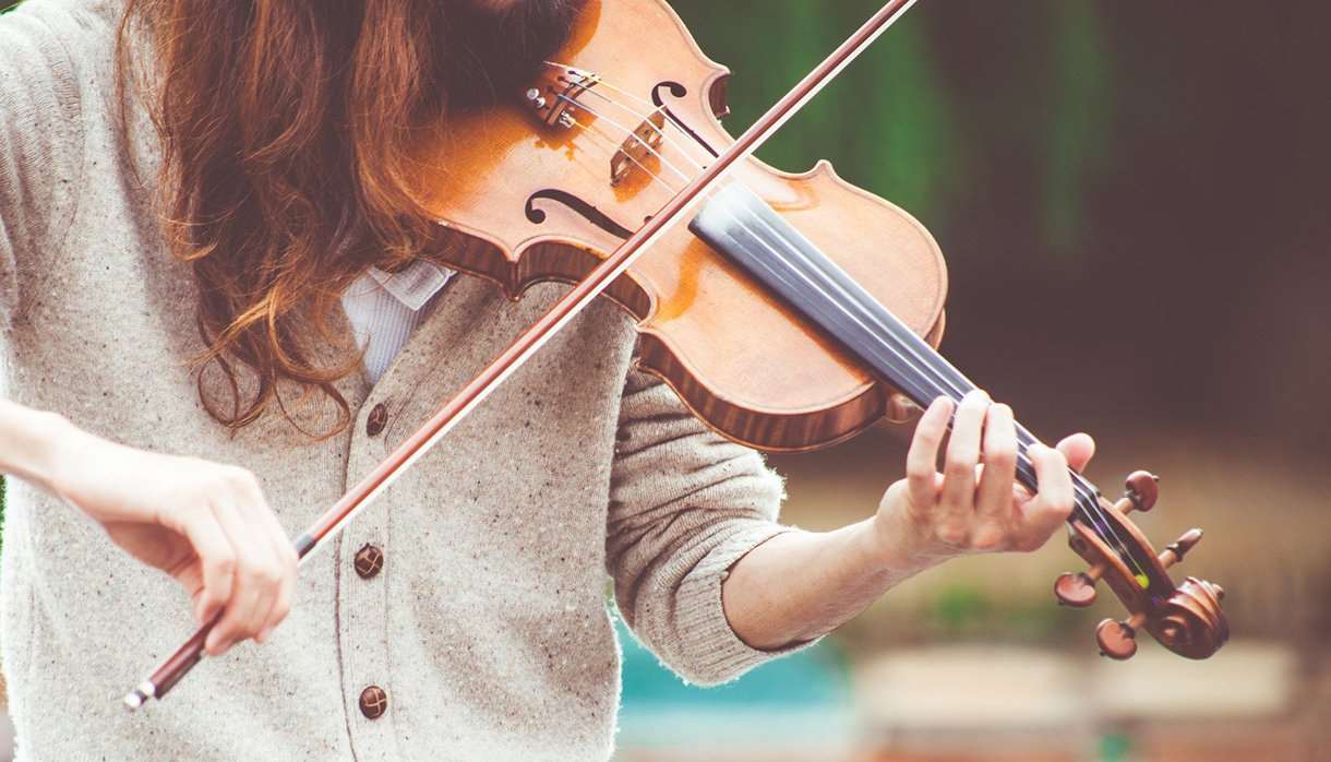 Person playing a violin