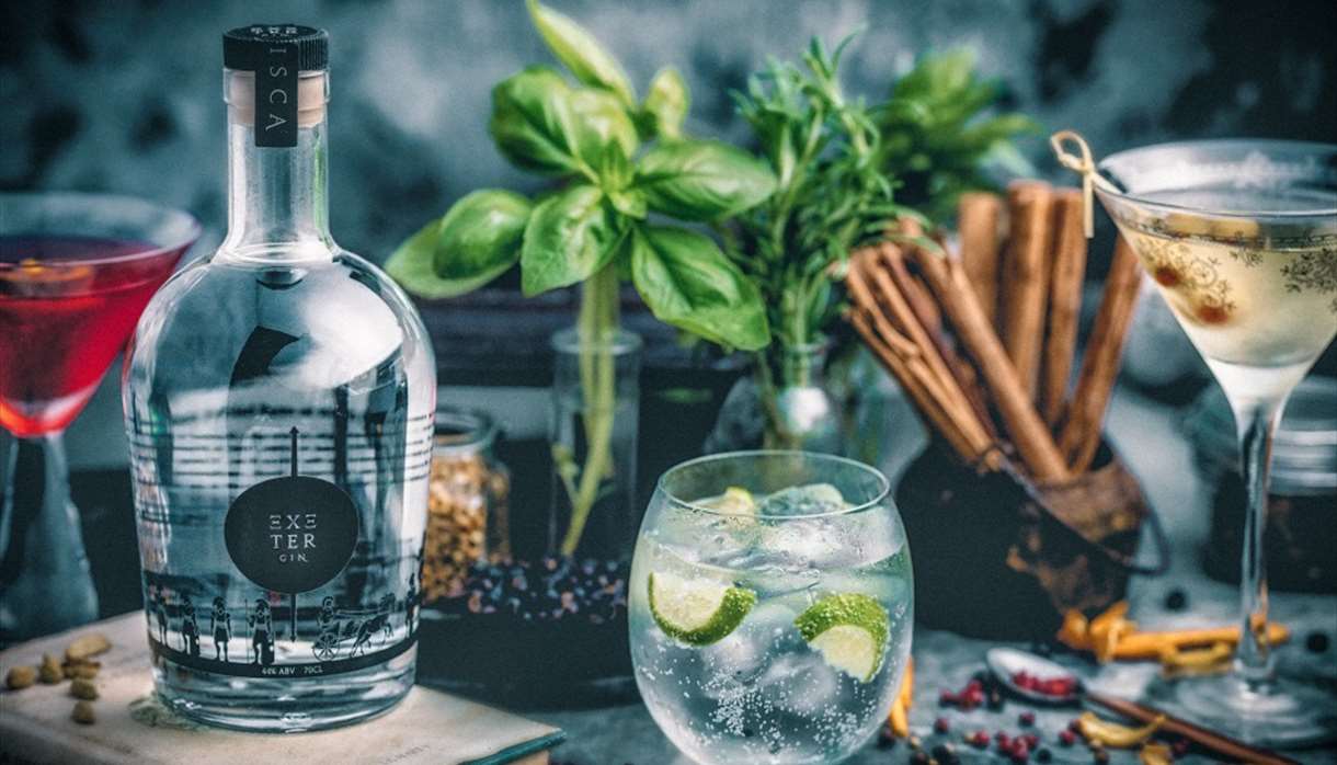 Exeter Gin presented in a glass with ice and a lime