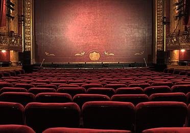 Empty seats in a performance theatre