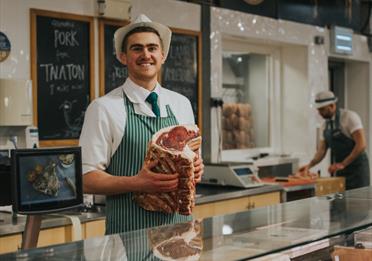 On-site butchers' department, stocking meat from the nearby family farm.