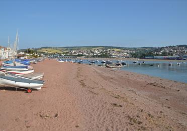 Shaldon Beach with boats on it