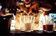 Bartender making cocktails