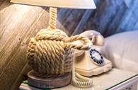 Bedside Table with Lamp and Telephone