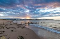 Dawlish Warren Beach and Groynes at Sunset