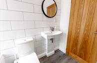 Bathroom with sink and toilet
