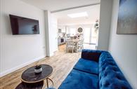 Living area with TV and sofa