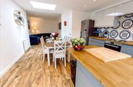 Open plan kitchen, dining area and living space