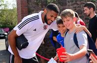 Taking a selfie with a player before the game