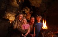 Family inside Kents Cavern Caves, Torquay