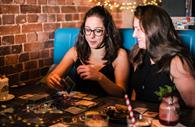 People playing board games