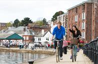 Cycling on Exeter Quayside. Copyright: Tony Cobley