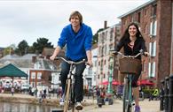 Cycling on Exeter Quayside. Copyright: Tony Cobley